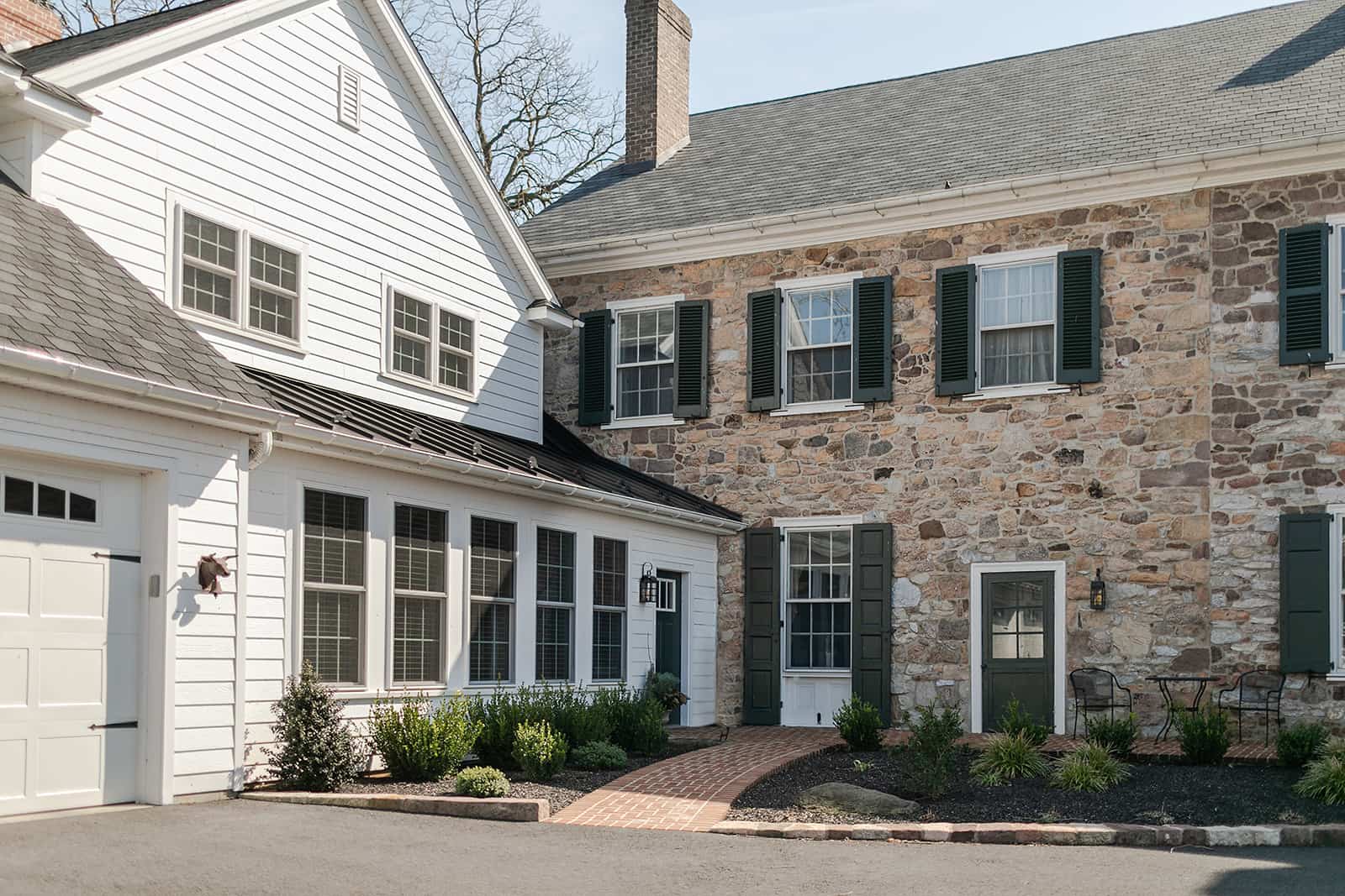 Two-story home exterior evaluated to build up or build out